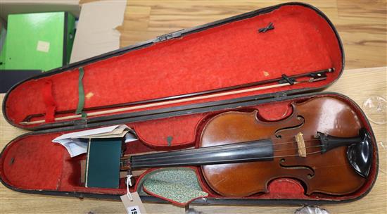 A 19th century violin with two-piece back, in wooden case with bow